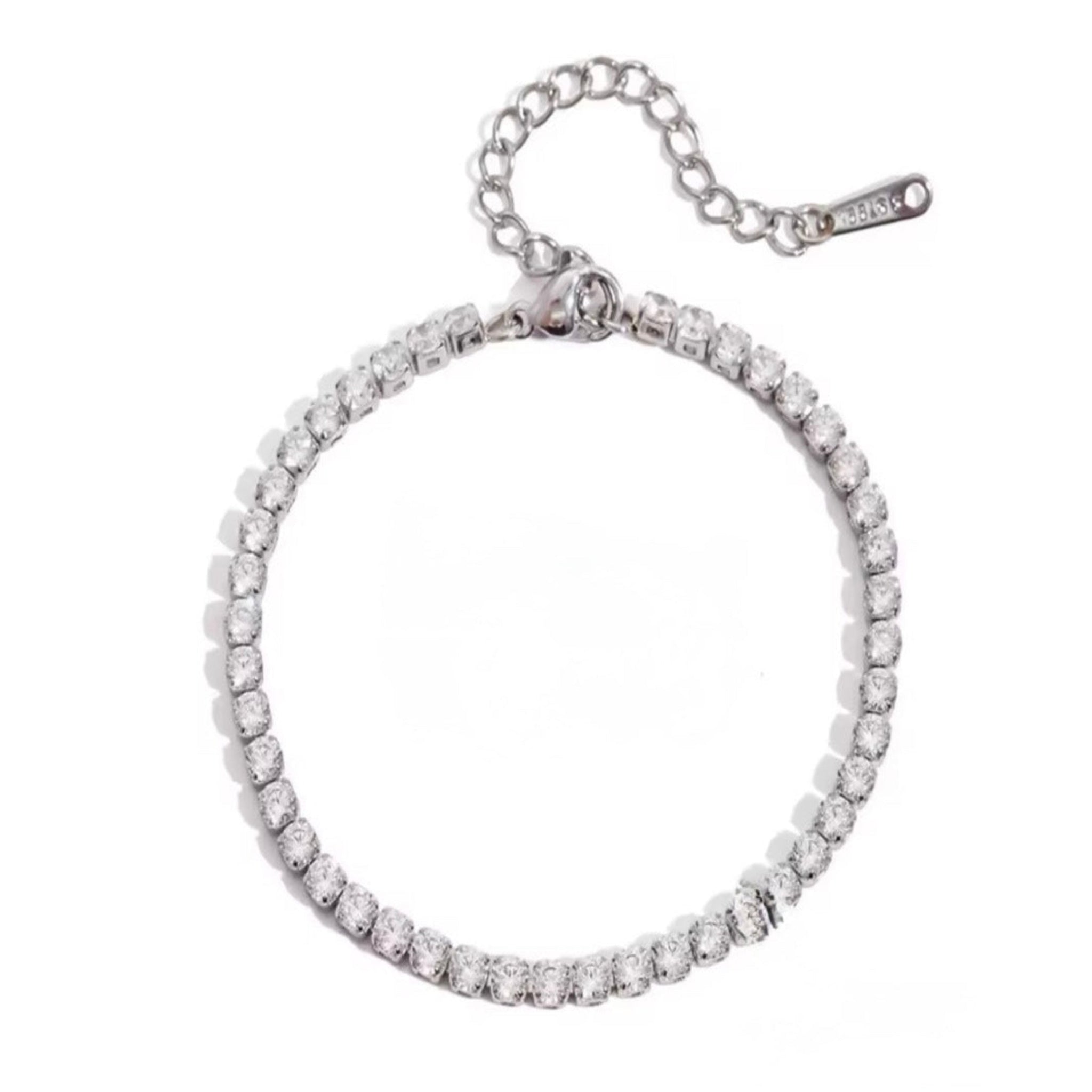Silver bracelet with cubic zirconia on a white background