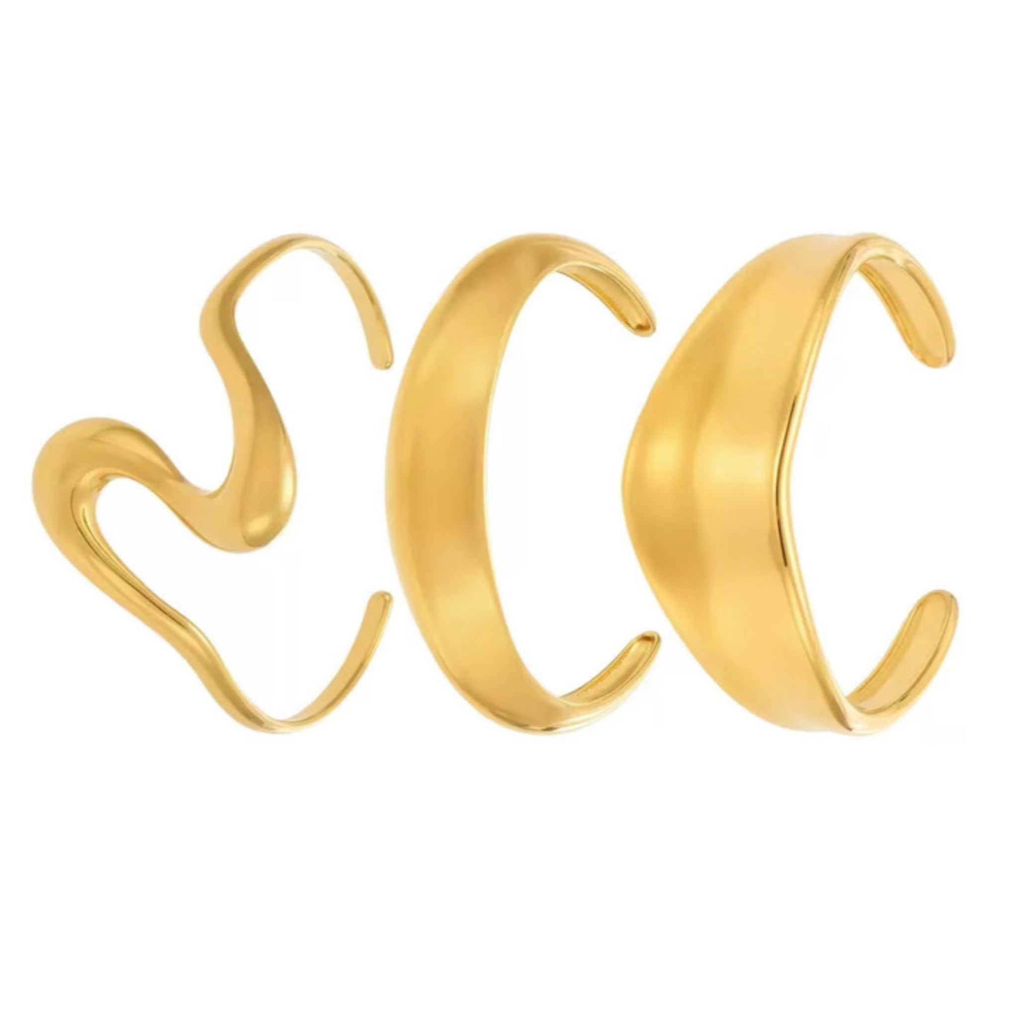 Three gold Bangles on a white background