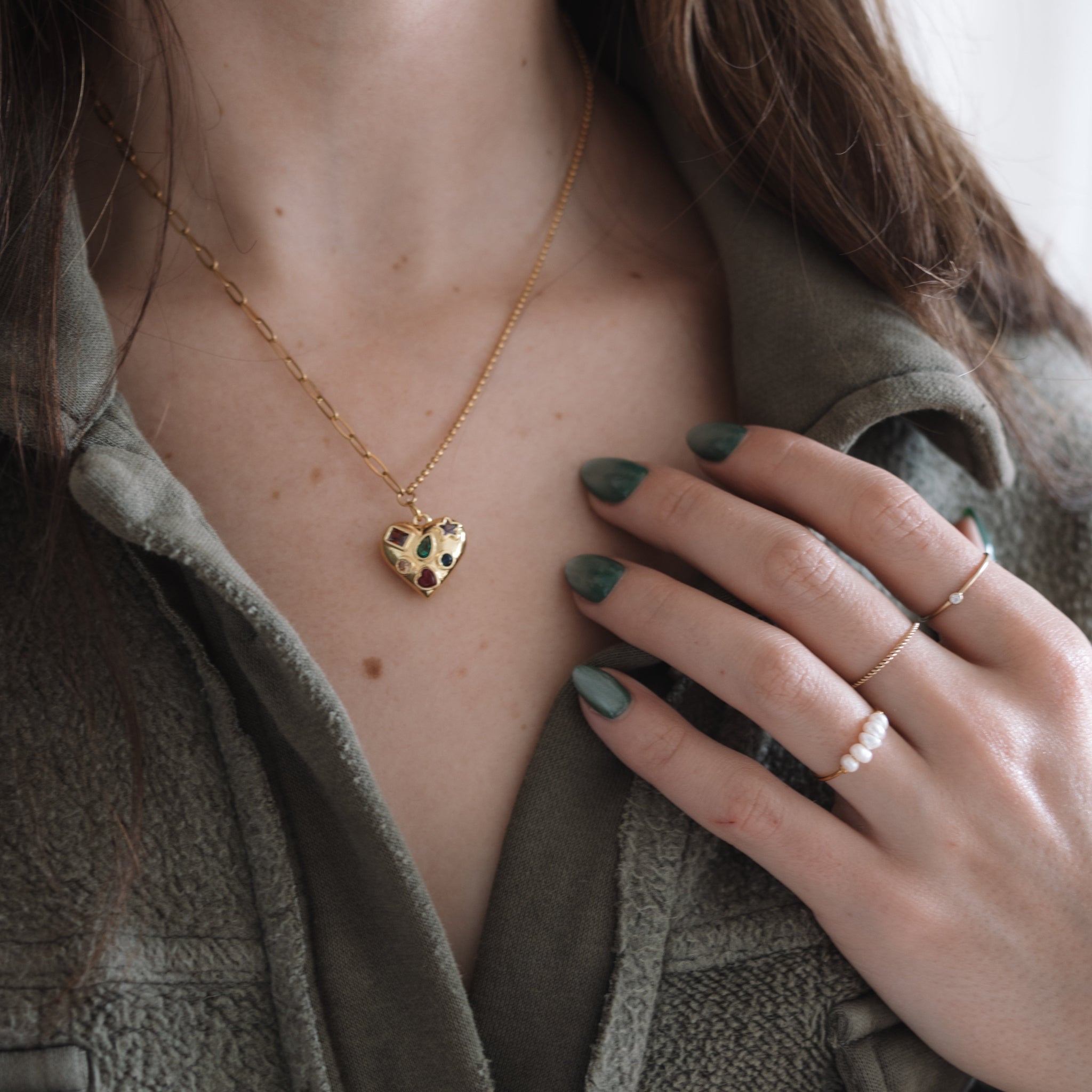 Girl wearing heart pendant
