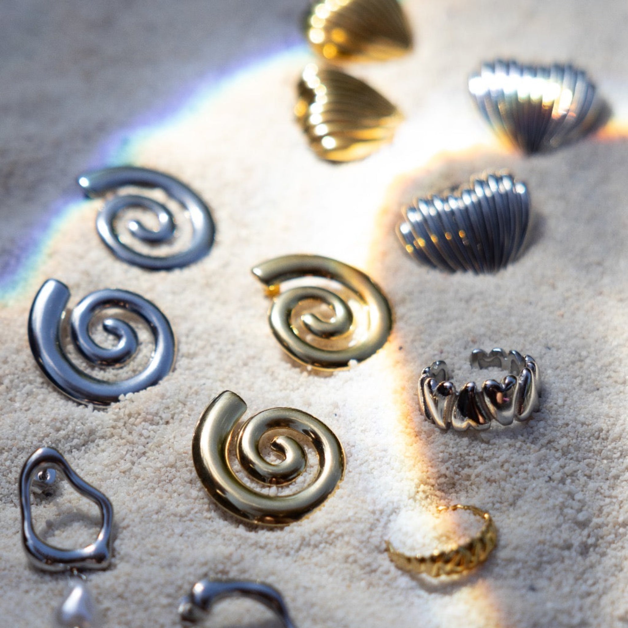 statement earring swirl