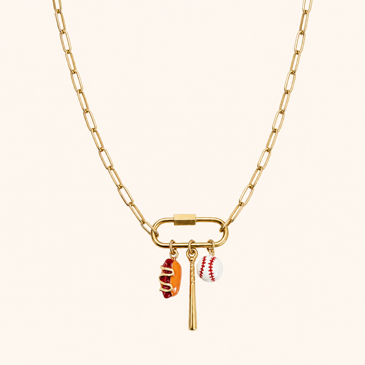 Gold paper clip chain necklace with carabiner clip and three charms