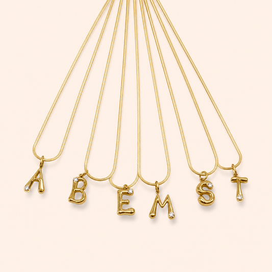 Gold bubble initial necklace with sparkling cubic zirconia accent