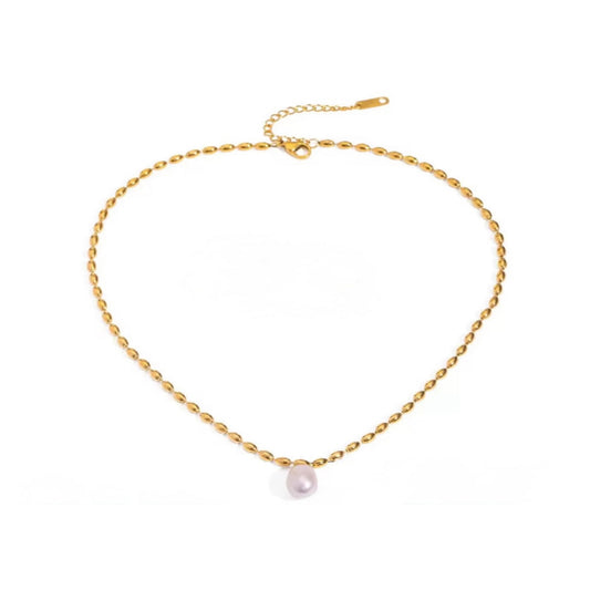 Gold necklace with a pink pearl pendant on a white background