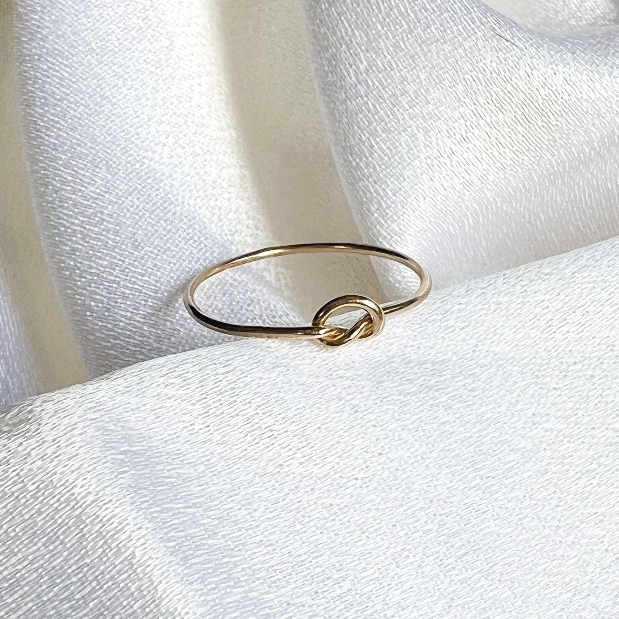 Gold dainty love me knot ring