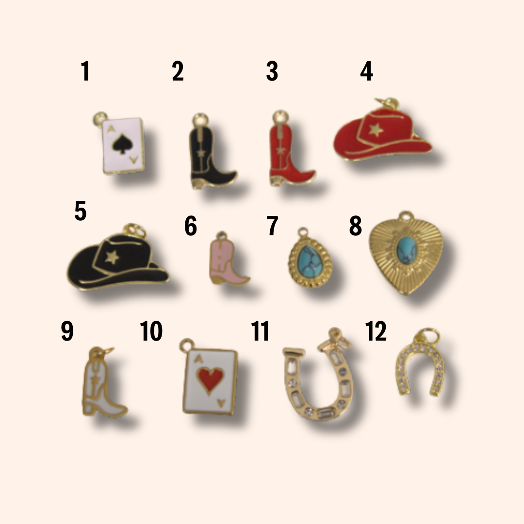Collection of various charms on a white background