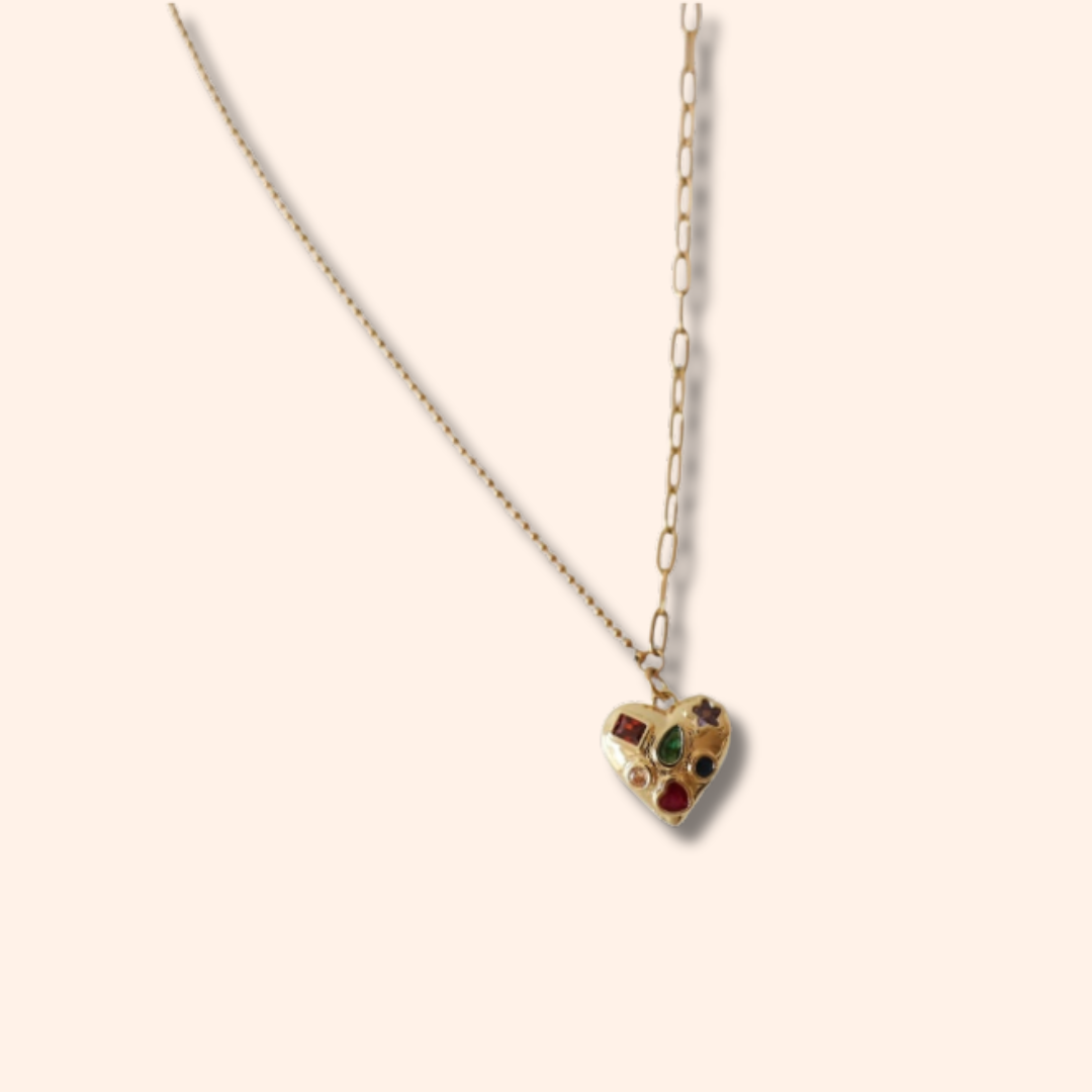 Necklace with a heart-shaped pendant on a beige background
